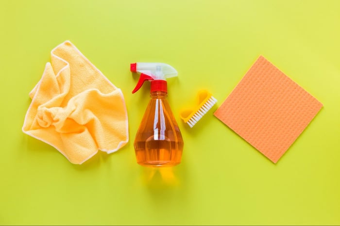 cleaning materials on green background