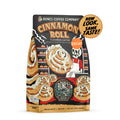 A 12 ounce bag of flavored coffee named Cinnamon Roll. It is cinnamon roll flavored, and the art has a skeleton holding out a fresh cinnamon roll on it. There is a swirl that says new look, same taste. A sticker says decaf on the bag.