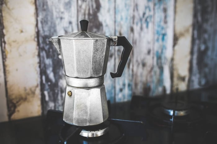 <h2><strong>Main Types of Cuban Coffee</strong></h2>

	<p>There are <strong>four main types of Cuban coffee</strong>, all known for their strong and sweet taste, which is achieved by mixing sugar with finely ground, <a href=../light-vs-dark-roast-coffee__dark-roasted.html coffee</a>.&nbsp;</p>

	<p>Cuban coffee is typically dark roasted, enhancing its rich, smoky flavor and creating a more intense taste than lighter roasts. This roasting style is essential for achieving the strong profile that Cuban coffee is known for.</p>

	<h3><strong><em>Cafecito</em></strong></h3>

	<p>Also known as Café Cubano, a <em>cafecito </em>is a <strong>small but strong Cuban espresso shot</strong> sweetened by adding sugar. It is typically topped with a creamy foam, made by whipping sugar with the first few drops of espresso. Drinking Café Cubano is a daily ritual and symbol of Cuban hospitality, whether you are at home or in Cuban restaurants.</p>

	<h3><strong>Colada</strong></h3>

	<p>A colada is a larger serving of Café Cubano, <strong>typically about 4 to 6 espresso shots</strong>. It is served in a styrofoam cup, and smaller cups are provided for sharing. Sharing these espresso cups is culturally significant, fostering conversation and social interaction among friends and family.</p>

	<h3><strong>Cortadito</strong></h3>

	<p>A cortadito is a small shot of <strong>Cuban espresso "cut" with steamed milk</strong>. The steamed milk softens the strong coffee flavor, creating a balance between the coffee's richness and the milk's creaminess. Some prefer using evaporated milk for a sweeter taste in this Cuban shot.</p>

	<h3><strong>Café con Leche</strong></h3>

	<p>A Café con Leche is a <strong>Cuban espresso with a more generous amount of milk, similar to a latte</strong>. It's often enjoyed with bread and butter and is a comforting staple in Cuban homes.</p>

	<table style="border: 2px solid black; border-collapse: collapse; width: 100%;">
		<tbody>
			<tr>
				<td style="border: 2px solid black; padding: 10px;">

					<p><strong>Organic Farming Practices</strong>: Much of the coffee produced in Cuba is grown using organic farming practices. The beans are hand-picked, and the cultivation methods often avoid artificial fertilizers, contributing to the unique flavor profile of Cuban coffee.</p>
				</td>
			</tr>
		</tbody>
	</table>

	<h2><strong>Equipment for Brewing Authentic Cuban Coffee at Home</strong></h2>
